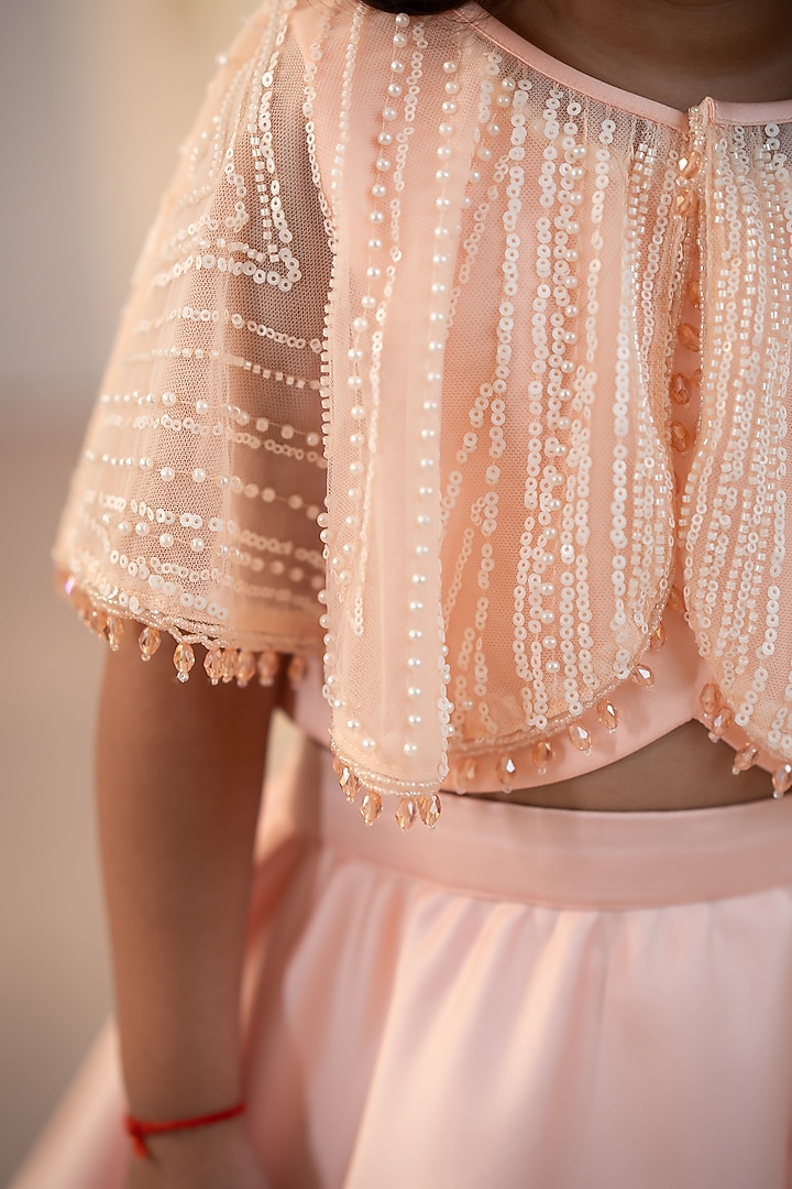 Peach Bridal Satin & Tulle Embroidered Jacket Lehenga Set For Girls by Ruchikalathlabel at Pernia's Pop Up Shop