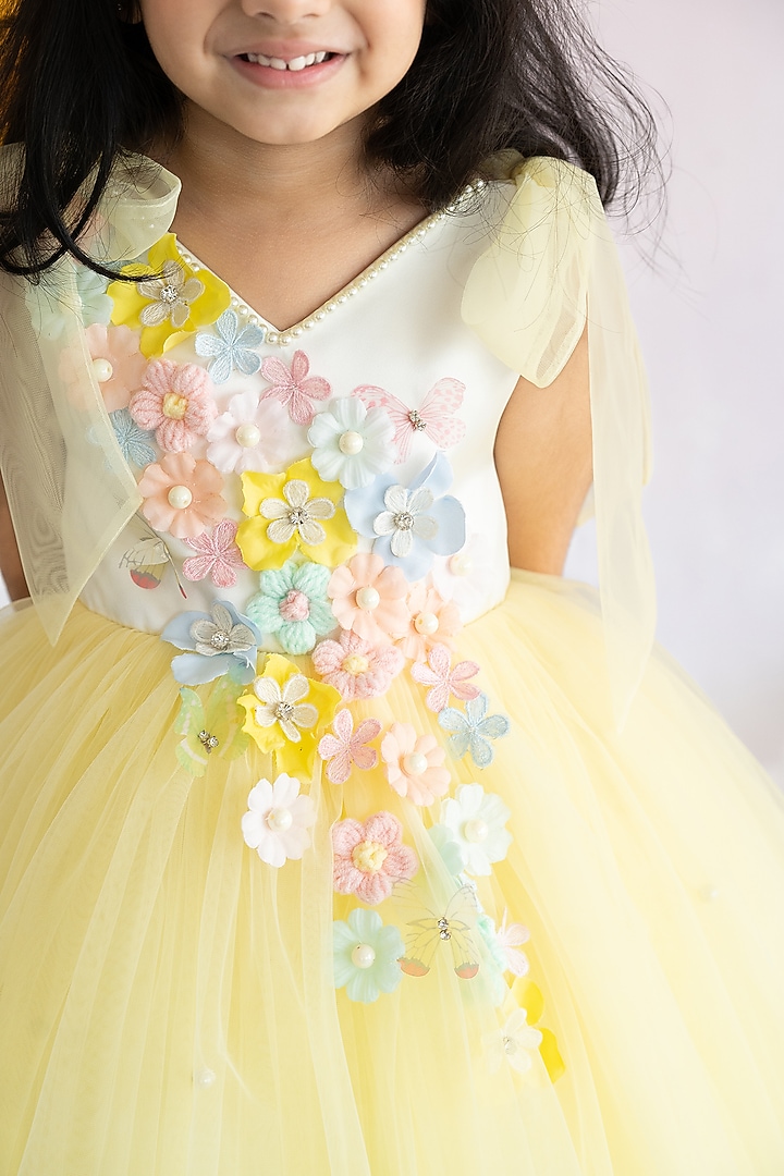 Yellow Bridal Satin & Soft Net Pearl Embroidered Fluffy Dress For Girls by Ruchikalathlabel at Pernia's Pop Up Shop