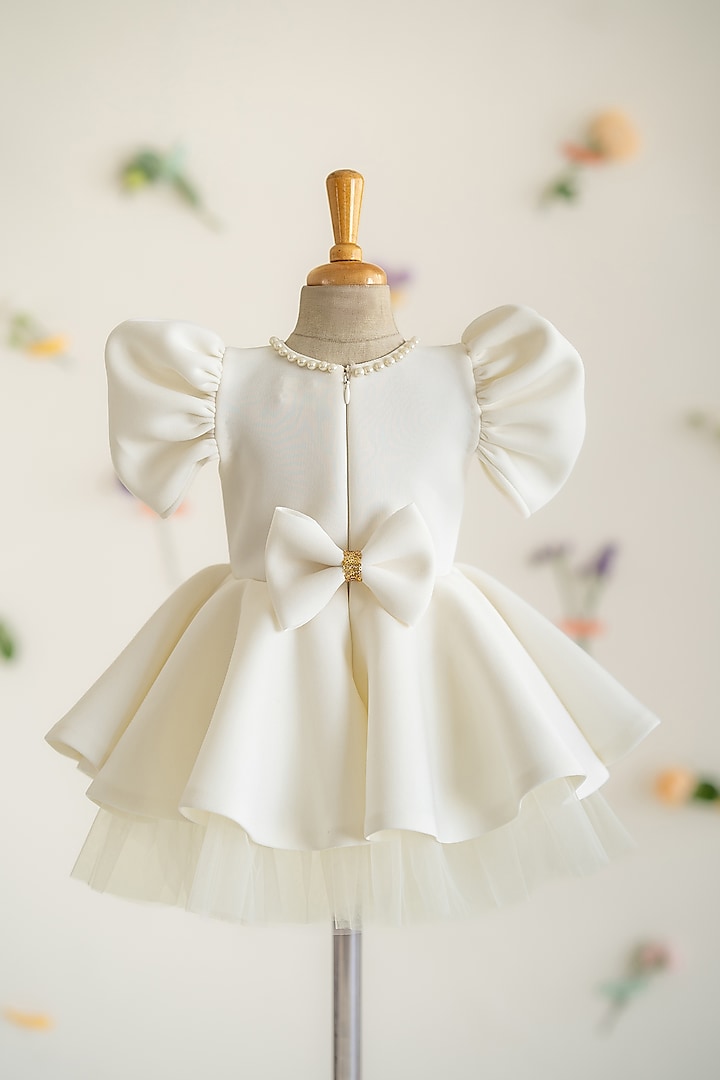 Off-White Scuba & Soft Net Hand Embroidered Flared Dress For Girls by Ruchikalathlabel at Pernia's Pop Up Shop
