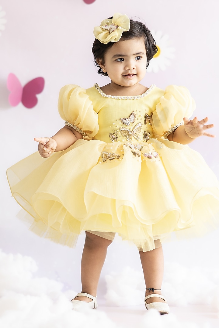 Yellow Textured Shimmer Organza & Tulle Hand Embroidered Dress For Girls by Ruchikalathlabel