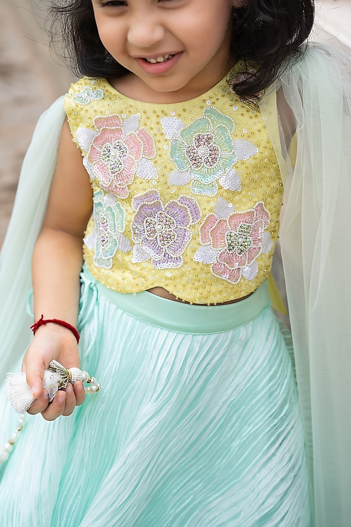 Mint Green Textured Pleated Organza & Butter Organza Lehenga Set For Girls by Ruchikalathlabel at Pernia's Pop Up Shop