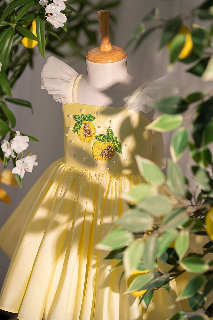Pastel Yellow Taffeta & Tulle Hand Embellished Dress For Girls by Ruchikalathlabel at Pernia's Pop Up Shop