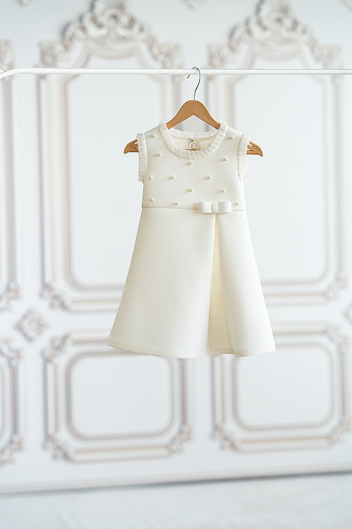 Off-White Soft Neoprene Pleated A-Line Dress For Girls by Ruchikalathlabel at Pernia's Pop Up Shop