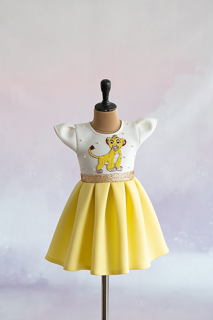 Yellow Soft Neoprene Simba Hand Embroidered Box-Pleated Dress For Girls by Ruchikalathlabel at Pernia's Pop Up Shop