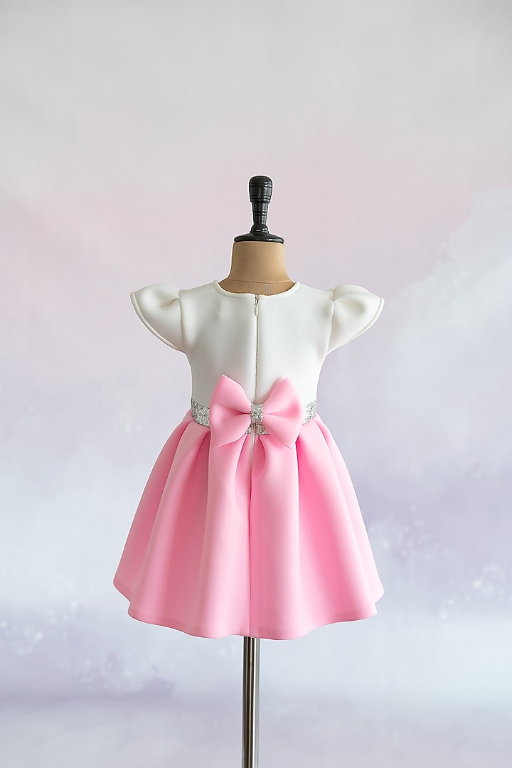 Pink Soft Neoprene Hand Embroidered Box-Pleated Dress For Girls by Ruchikalathlabel at Pernia's Pop Up Shop 2026 Pink Soft Neoprene Hand Embroidered Box-Pleated Dress For Girls by Ruchikalathlabel at Pernia's Pop Up Shop 2026