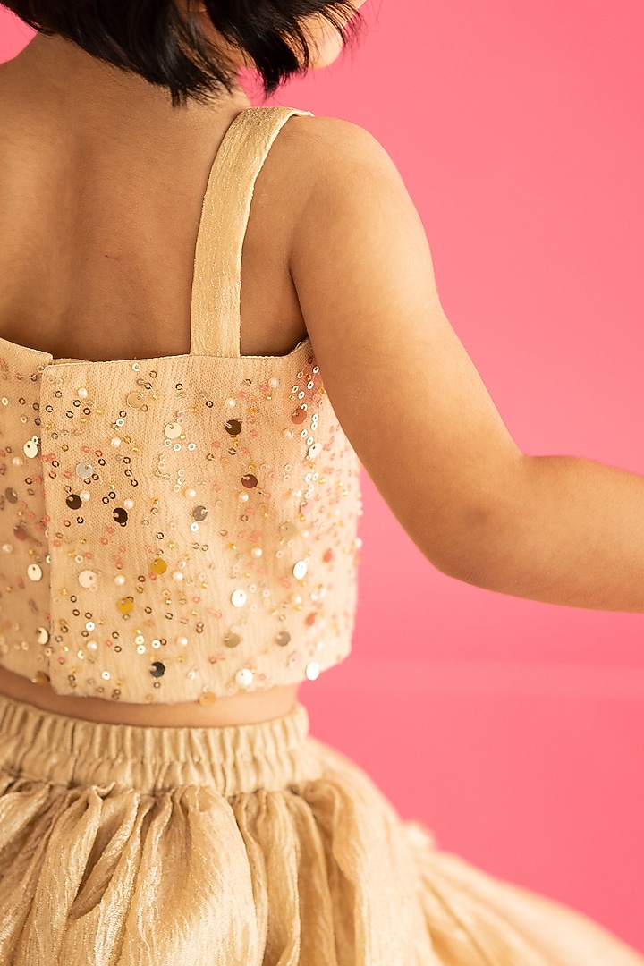 Golden Textured Organza Stone Embellished Lehenga Set For Girls by Ruchikalathlabel at Pernia's Pop Up Shop
