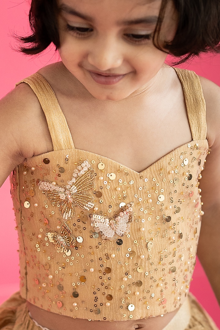 Golden Textured Organza Stone Embellished Lehenga Set For Girls by Ruchikalathlabel at Pernia's Pop Up Shop