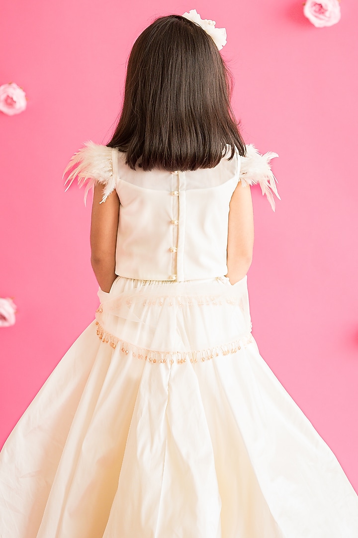White Taffeta Pleated Lehenga Set For Girls by Ruchikalathlabel at Pernia's Pop Up Shop