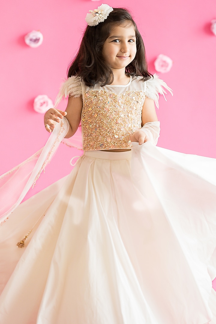 White Taffeta Pleated Lehenga Set For Girls by Ruchikalathlabel at Pernia's Pop Up Shop