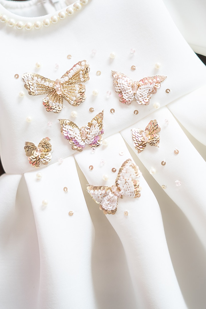 White Scuba Hand Embroidered Dress For Girls by Ruchikalathlabel at Pernia's Pop Up Shop