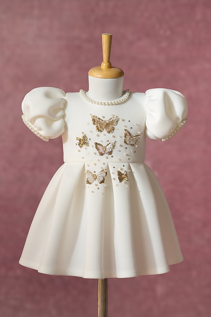 White Scuba Hand Embroidered Pleated Dress For Girls by Ruchikalathlabel at Pernia's Pop Up Shop