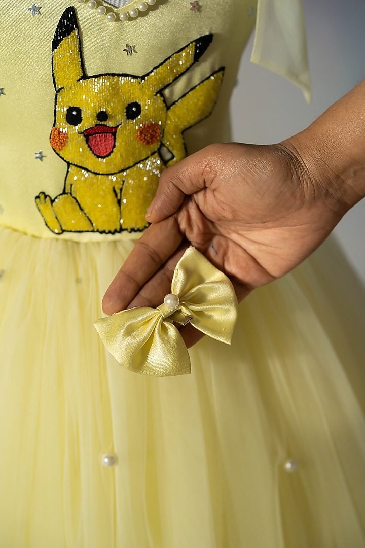 Yellow Bridal Satin & Net Hand Embroidered Tie-Up Dress For Girls by Ruchikalathlabel at Pernia's Pop Up Shop