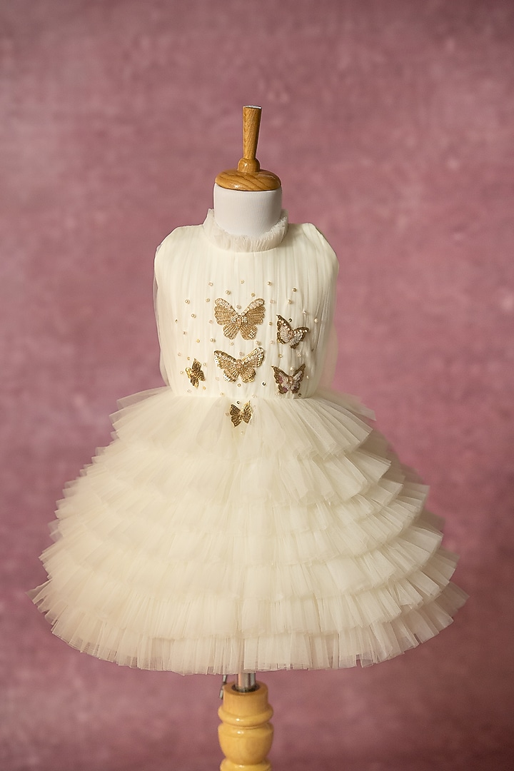 Off-White Net Hand Embroidered Layered Dress For Girls by Ruchikalathlabel at Pernia's Pop Up Shop