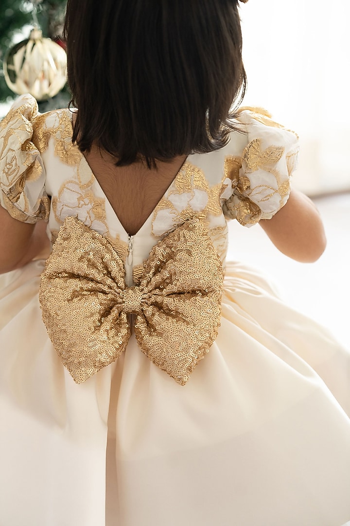 Cream Jacquard & Bridal Satin Flared Dress For Girls Design by Ruchikalathlabel at Pernia's Pop Up Shop 2026 Cream Jacquard & Bridal Satin Flared Dress For Girls Design by Ruchikalathlabel at Pernia's Pop Up Shop 2026