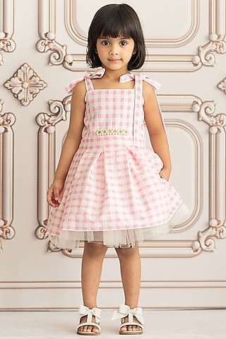 Pink & White Textured Cotton Checkered Dress For Girls by Ruchikalathlabel