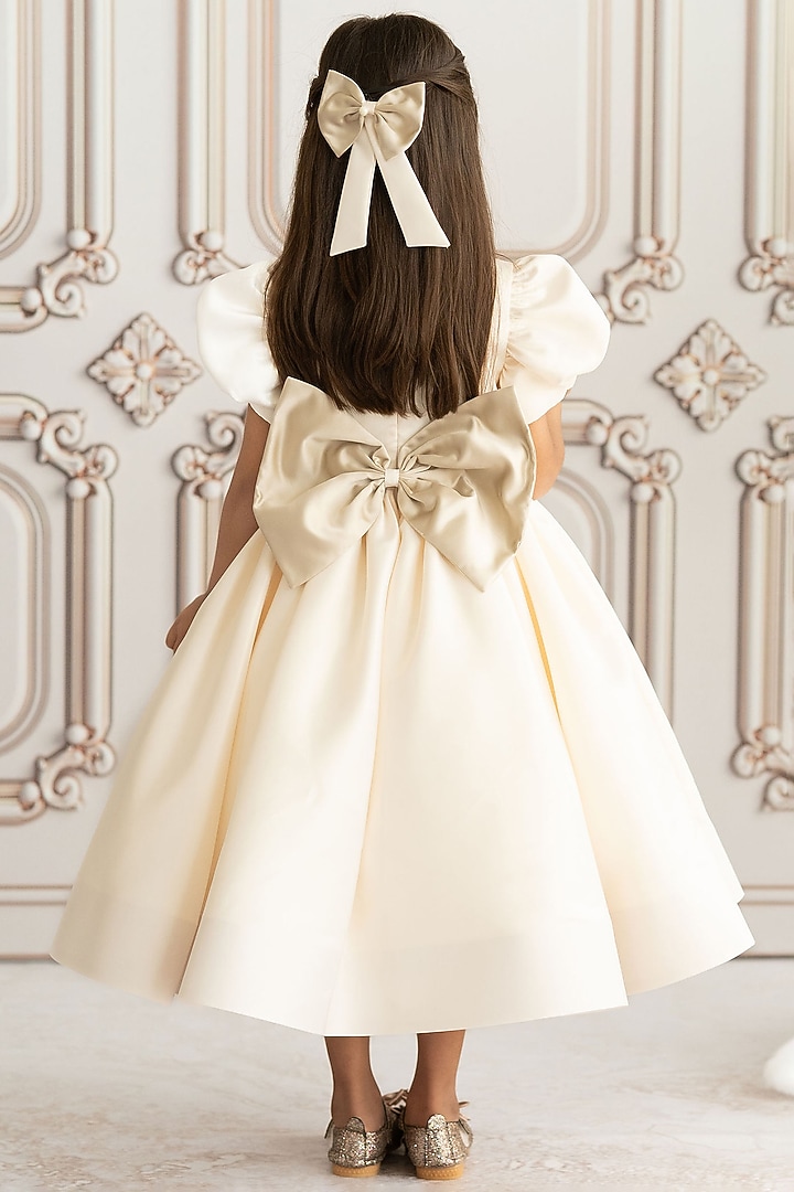 Off-White Bridal Satin Hand Embroidered Gown For Girls by Ruchikalathlabel at Pernia's Pop Up Shop