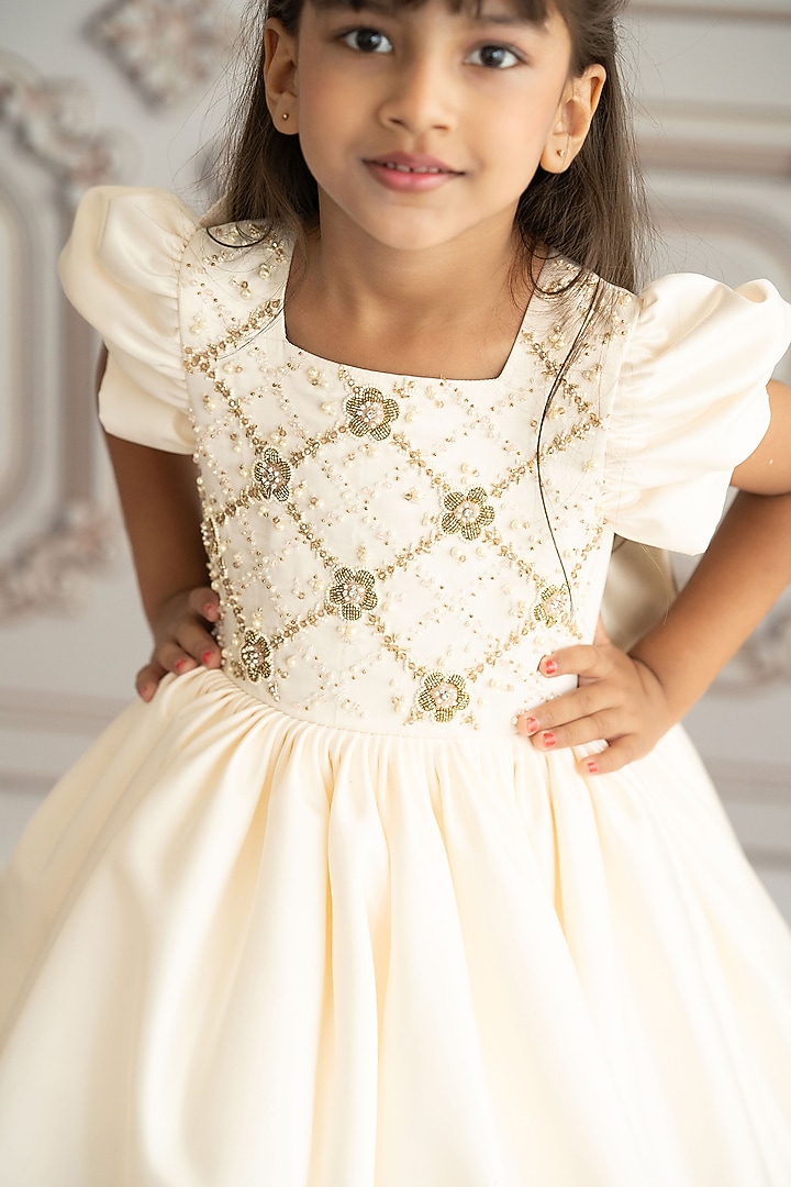Off-White Bridal Satin Hand Embroidered Gown For Girls by Ruchikalathlabel at Pernia's Pop Up Shop