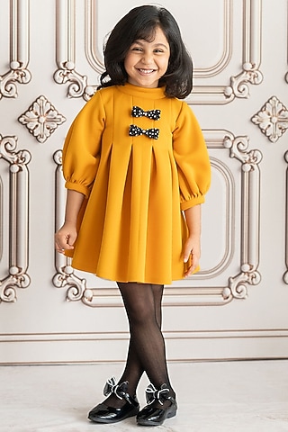 Mustard Neoprene & Scuba Pleated A-Line Dress For Girls by Ruchikalathlabel