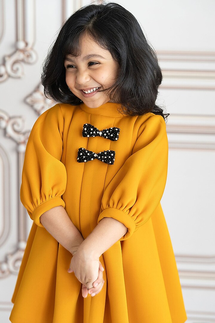 Mustard Neoprene & Scuba Pleated A-Line Dress For Girls by Ruchikalathlabel at Pernia's Pop Up Shop