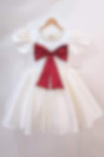 Cream Taffeta Blend Flared Bow Dress For Girls by Ruchikalathlabel at Pernia's Pop Up Shop