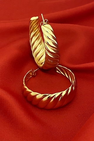 Gold Plated Hoop Earrings In Brass by Radhika Agrawal Jewels