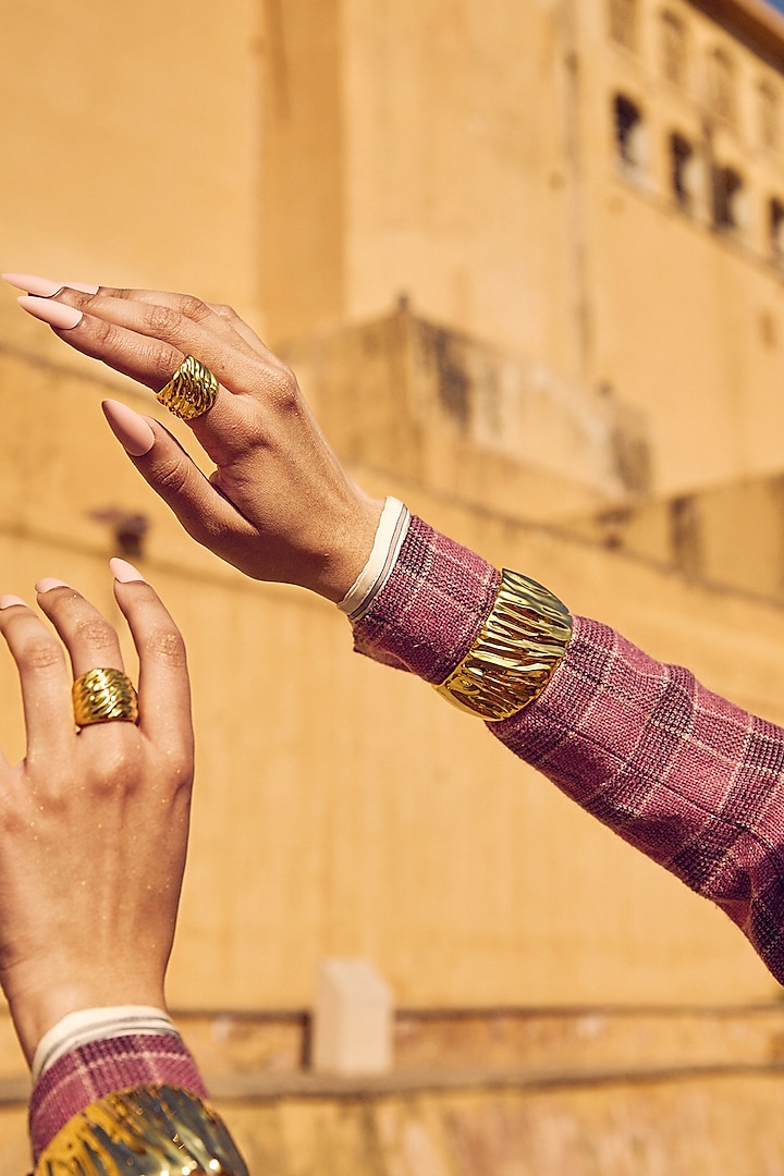 Gold Finish Textured Cuff Bracelet by Radhika Agrawal Jewels at Pernia's Pop Up Shop