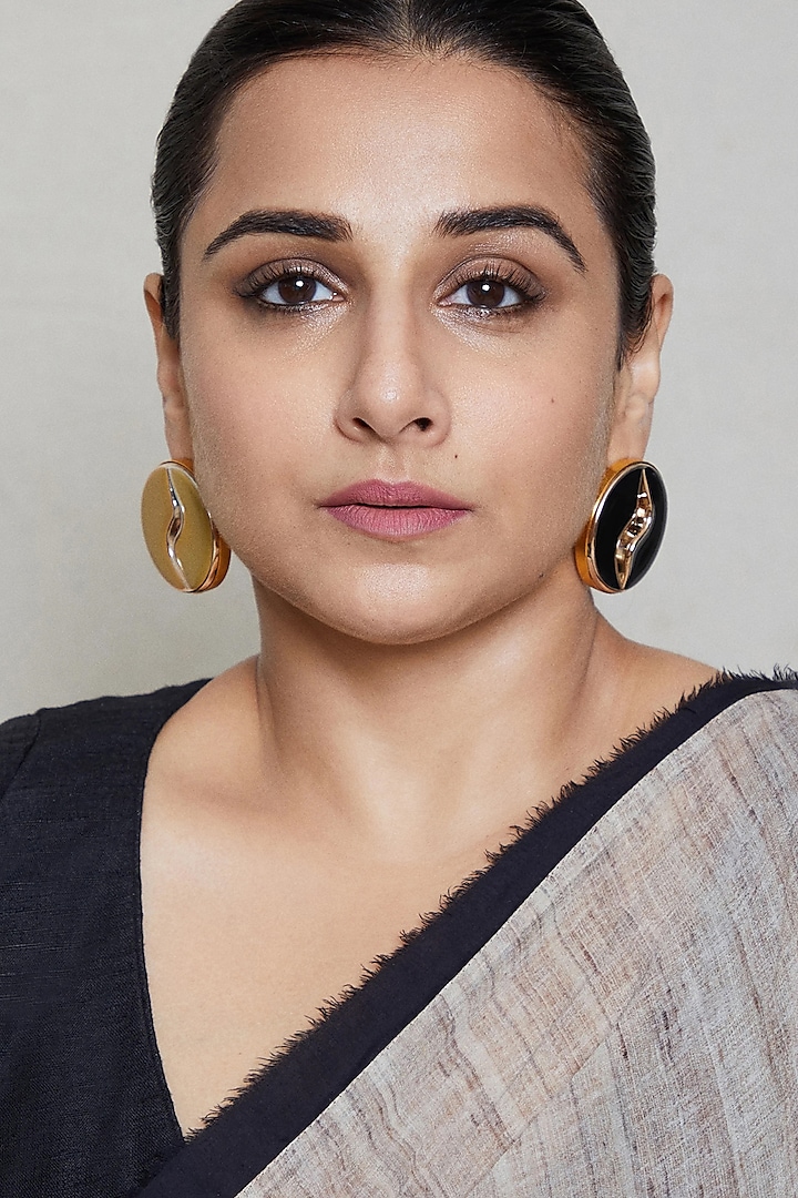Gold Finish Asymmetric Earrings by Radhika Agrawal Jewels