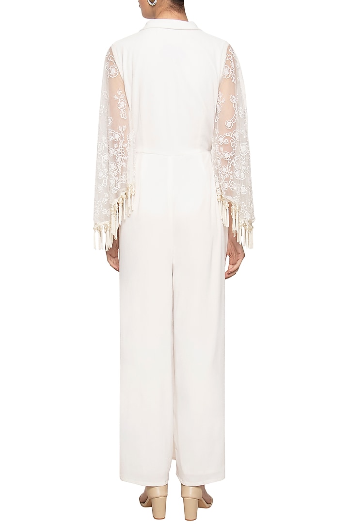 Ivory embroidered fringe jumpsuit by Ridhi Arora at Pernia's Pop Up Shop