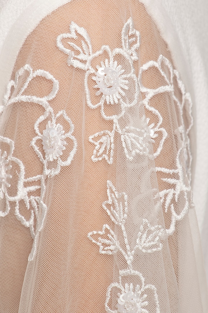 Ivory embroidered fringe jumpsuit by Ridhi Arora at Pernia's Pop Up Shop