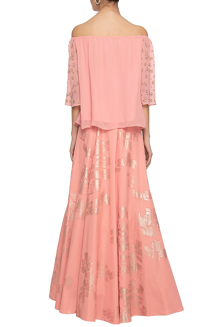 Peach embroidered crop top with skirt by Ridhi Arora at Pernia's Pop Up Shop