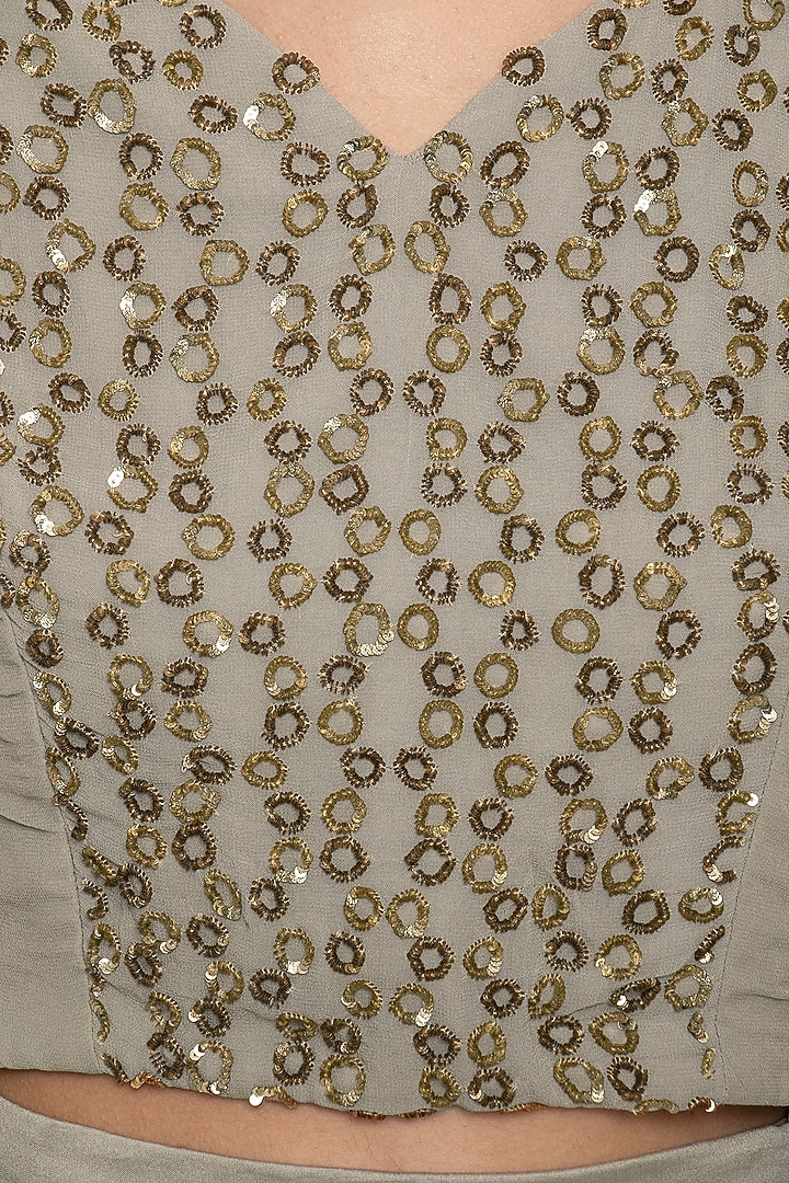 Grey gold embroidered crop top with skirt by Ridhi Arora at Pernia's Pop Up Shop