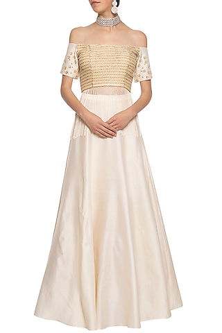 Ivory embroidered crop top with skirt by Ridhi Arora