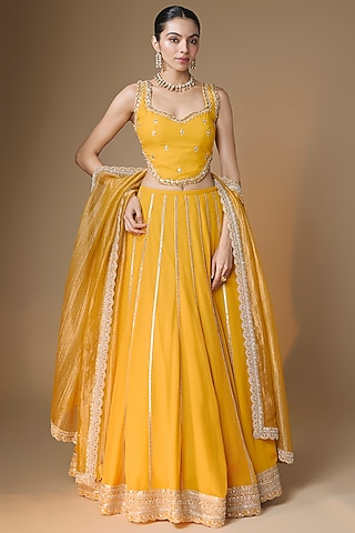 Sunset Yellow Viscose Georgette Panelled Embroidered Lehenga Set by Renee Label