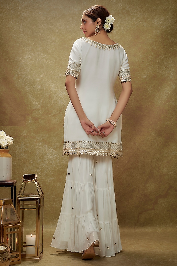 Ivory Viscose Georgette Mirror Embroidered Tiered Party Wear Sharara Set by Renee Label at Pernia's Pop Up Shop