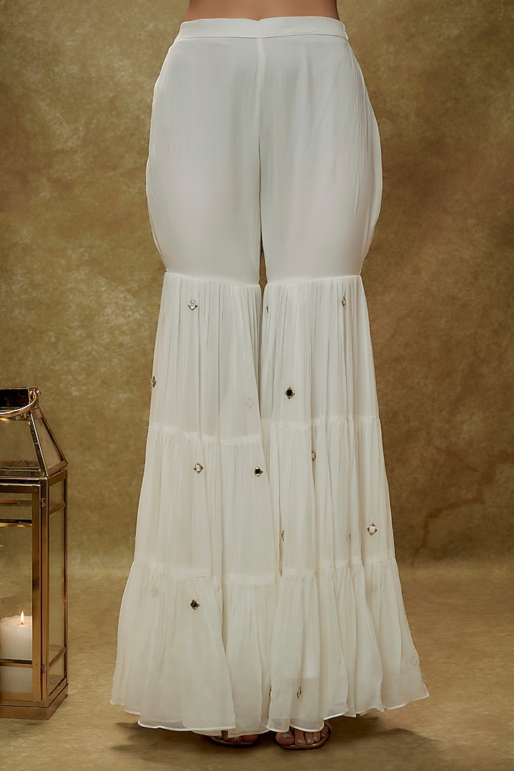 Ivory Viscose Georgette Mirror Embroidered Tiered Party Wear Sharara Set by Renee Label at Pernia's Pop Up Shop