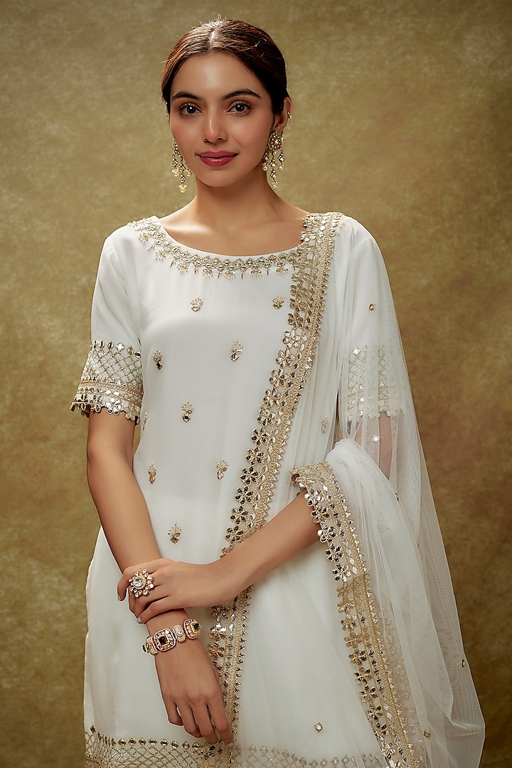 Ivory Viscose Georgette Mirror Embroidered Tiered Party Wear Sharara Set by Renee Label at Pernia's Pop Up Shop