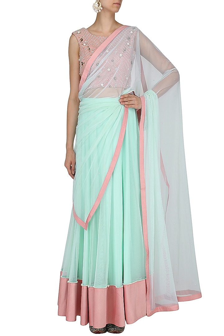 Mint and blush pink lehenga set available only at Pernia's Pop Up Shop.