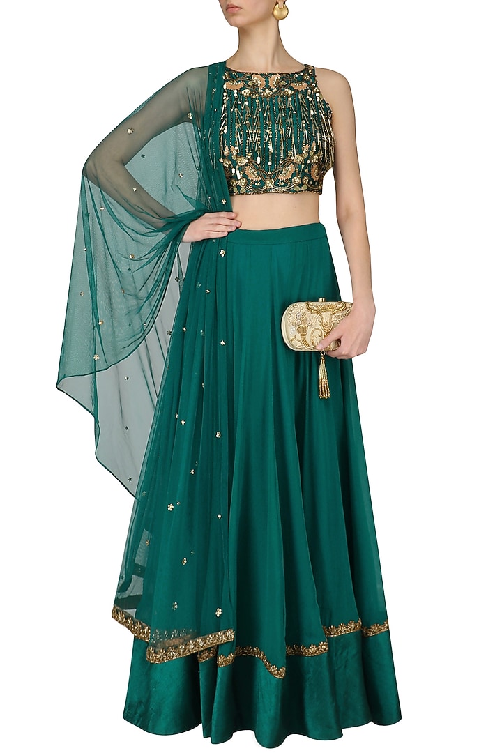 Teal nouveau embroidered tassel crop top lehenga set available only at Pernia's Pop Up Shop.