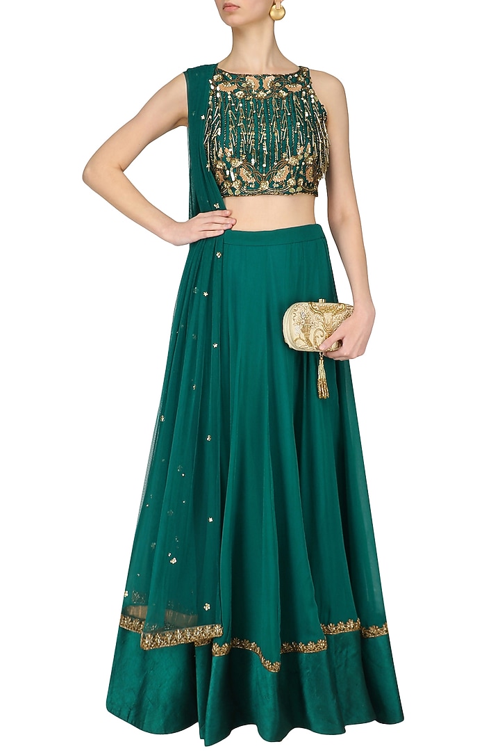 Teal nouveau embroidered tassel crop top lehenga set available only at Pernia's Pop Up Shop.