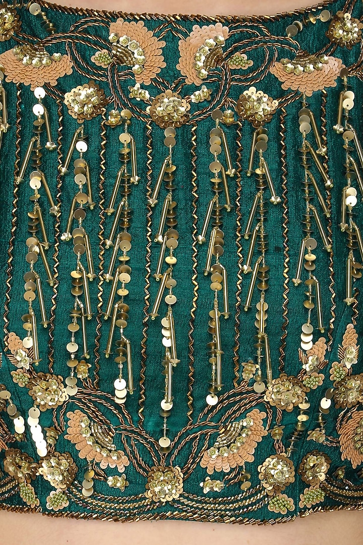 Teal nouveau embroidered tassel crop top lehenga set available only at Pernia's Pop Up Shop.