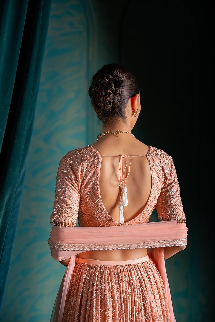 Peach Viscose Georgette Sequins Embroidered Wedding Lehenga Set by Renee Label at Pernia's Pop Up Shop