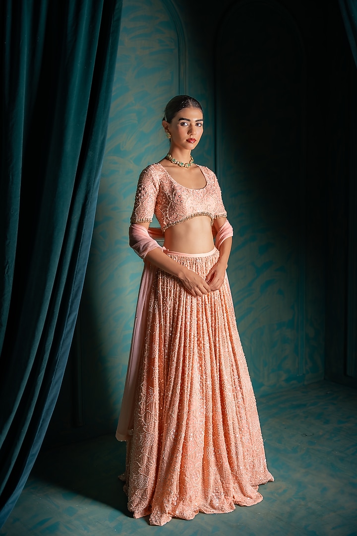 Peach Viscose Georgette Sequins Embroidered Wedding Lehenga Set by Renee Label at Pernia's Pop Up Shop