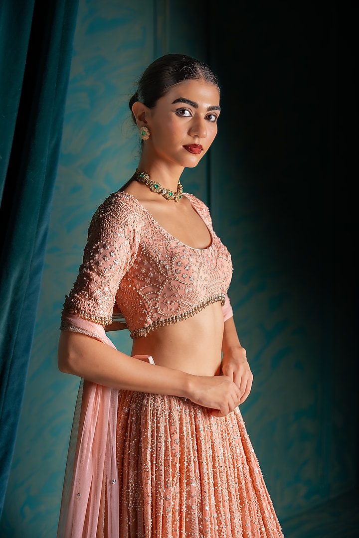 Peach Viscose Georgette Sequins Embroidered Wedding Lehenga Set by Renee Label at Pernia's Pop Up Shop
