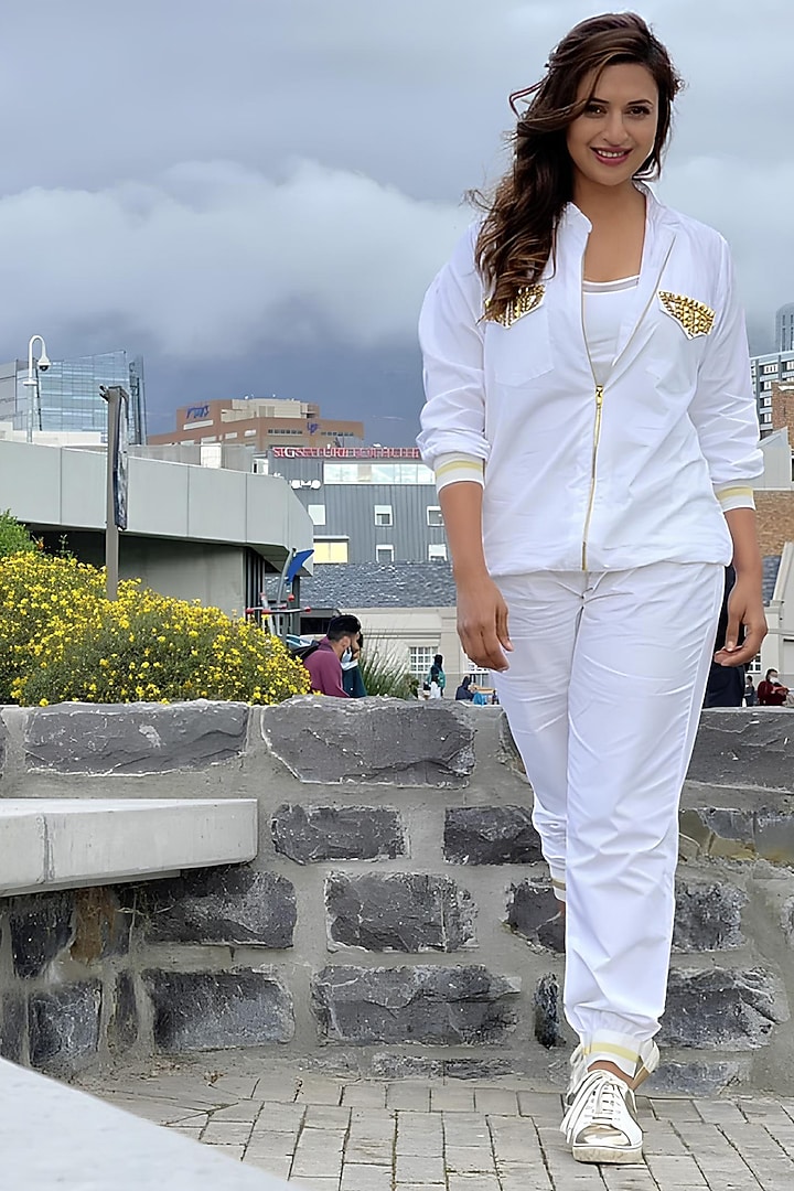 White Cotton Studwork Bomber Jacket by Richaa Goenka at Pernia's Pop Up Shop