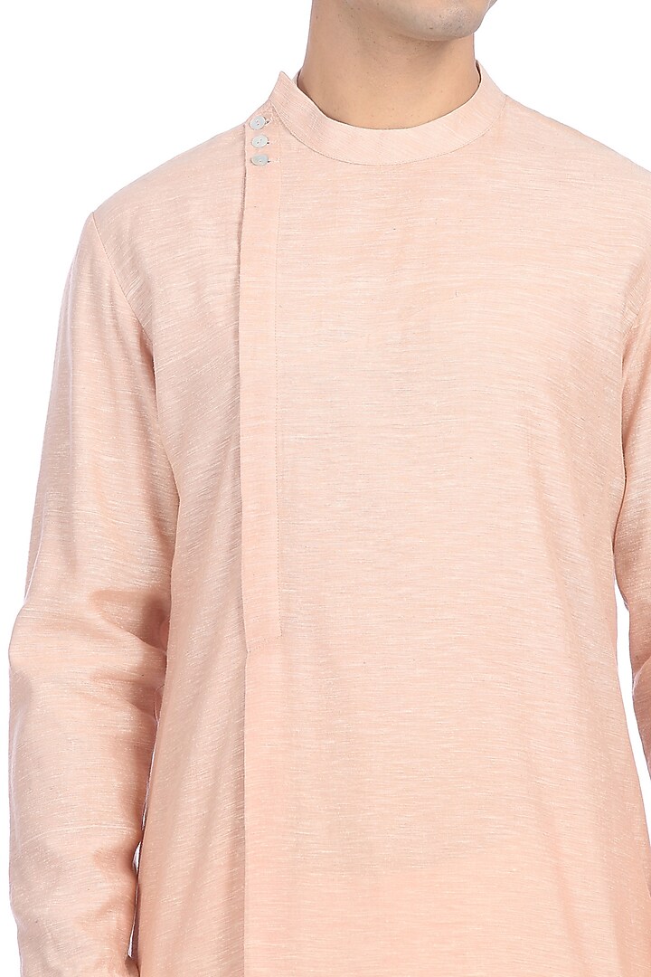 Peach Noil Asymmetric Kurta by Rohit Gandhi & Rahul Khanna Men at Pernia's Pop Up Shop