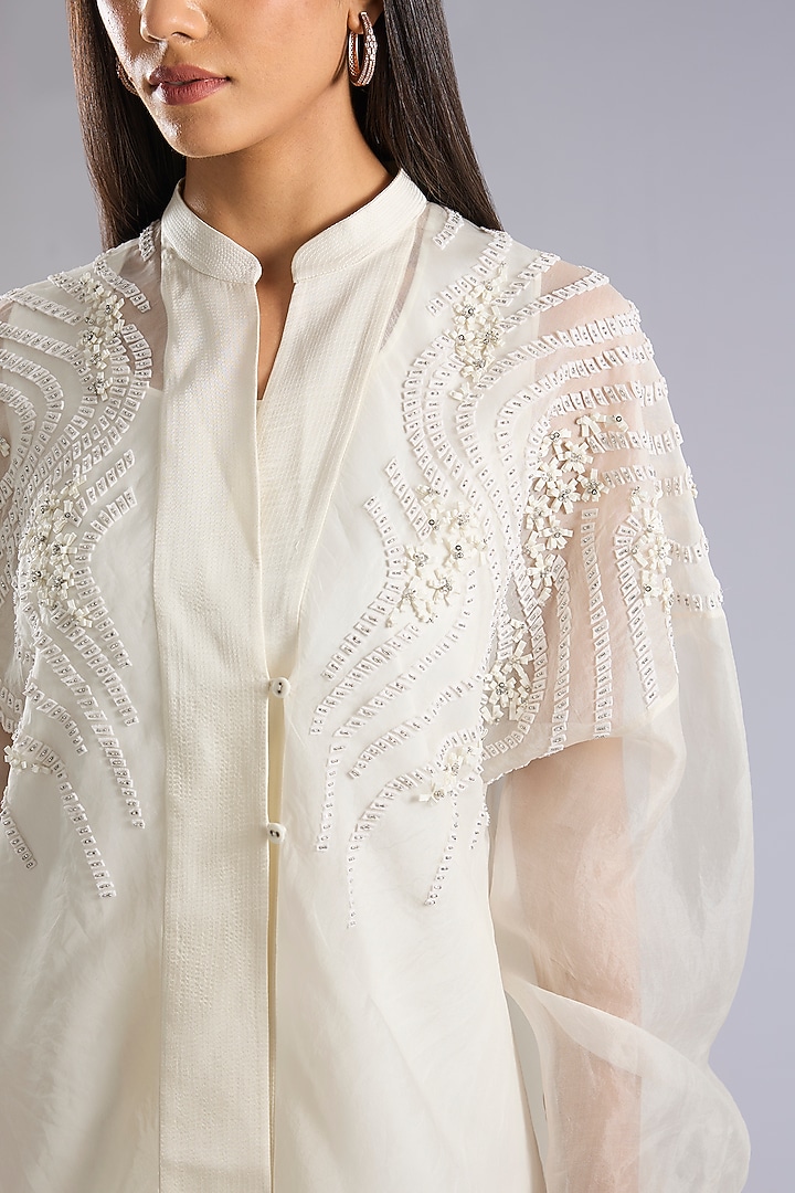 Ivory Organza Bead Work Asymmetric Top by Rohit Gandhi & Rahul Khanna at Pernia's Pop Up Shop