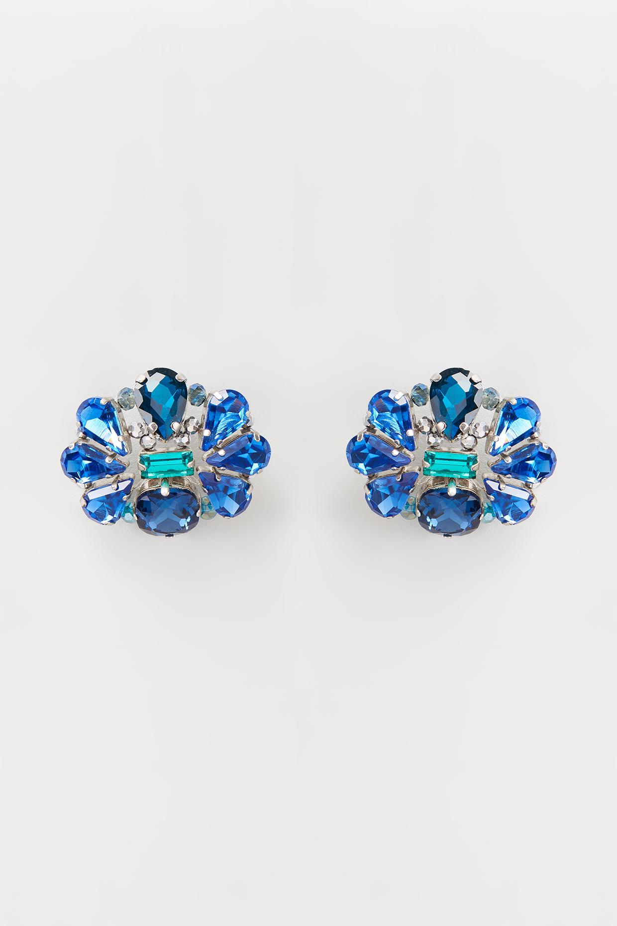 White Rhodium Finish Blue Crystal Stud Earrings by Rhea