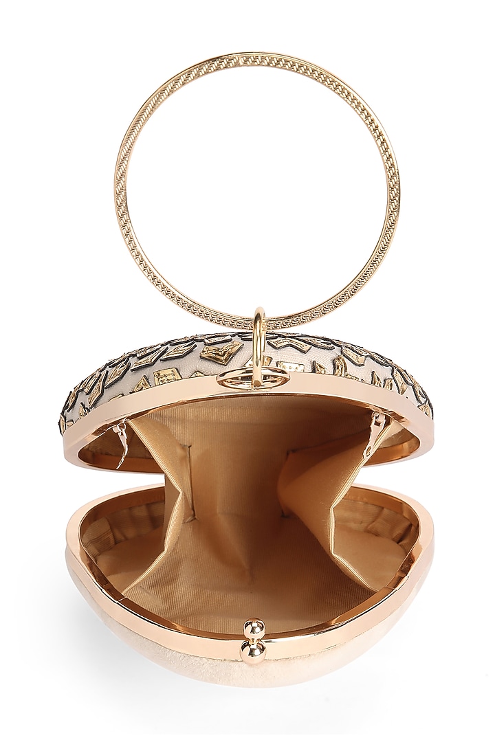 Gold Suede Leather Cutwork & Applique Embroidered Oval-Shaped Clutch by Richa Gupta at Pernia's Pop Up Shop