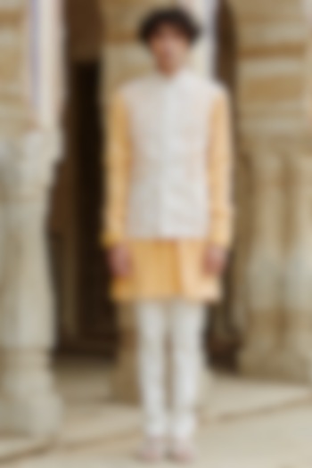 Yellow Kurta Set With Hand Embroidered Bundi Jacket by Rahul Mishra Men