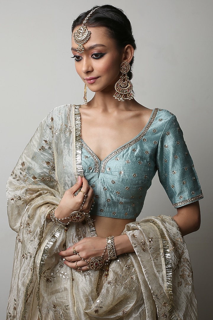 Ivory Embroidered Wedding Lehenga Set by Rhua at Pernia's Pop Up Shop